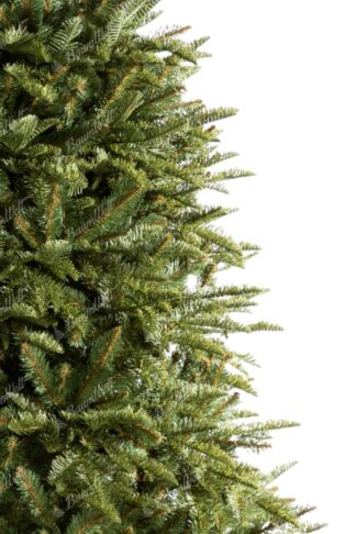 Künstlicher Weihnachtsbaum 3D Kaukasus Tanne XL. Der Baum hat dichte hellgrüne Nadeln.