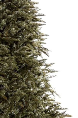 Künstlicher Weihnachtsbaum FULL 3D Nordmanntanne. Der Baum hat dicke grüne Äste.