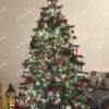 Künstlicher Weihnachtsbaum FULL 3D Fichte Exklusiv 180cm ist mit weißen und roten Dekorationen verziert